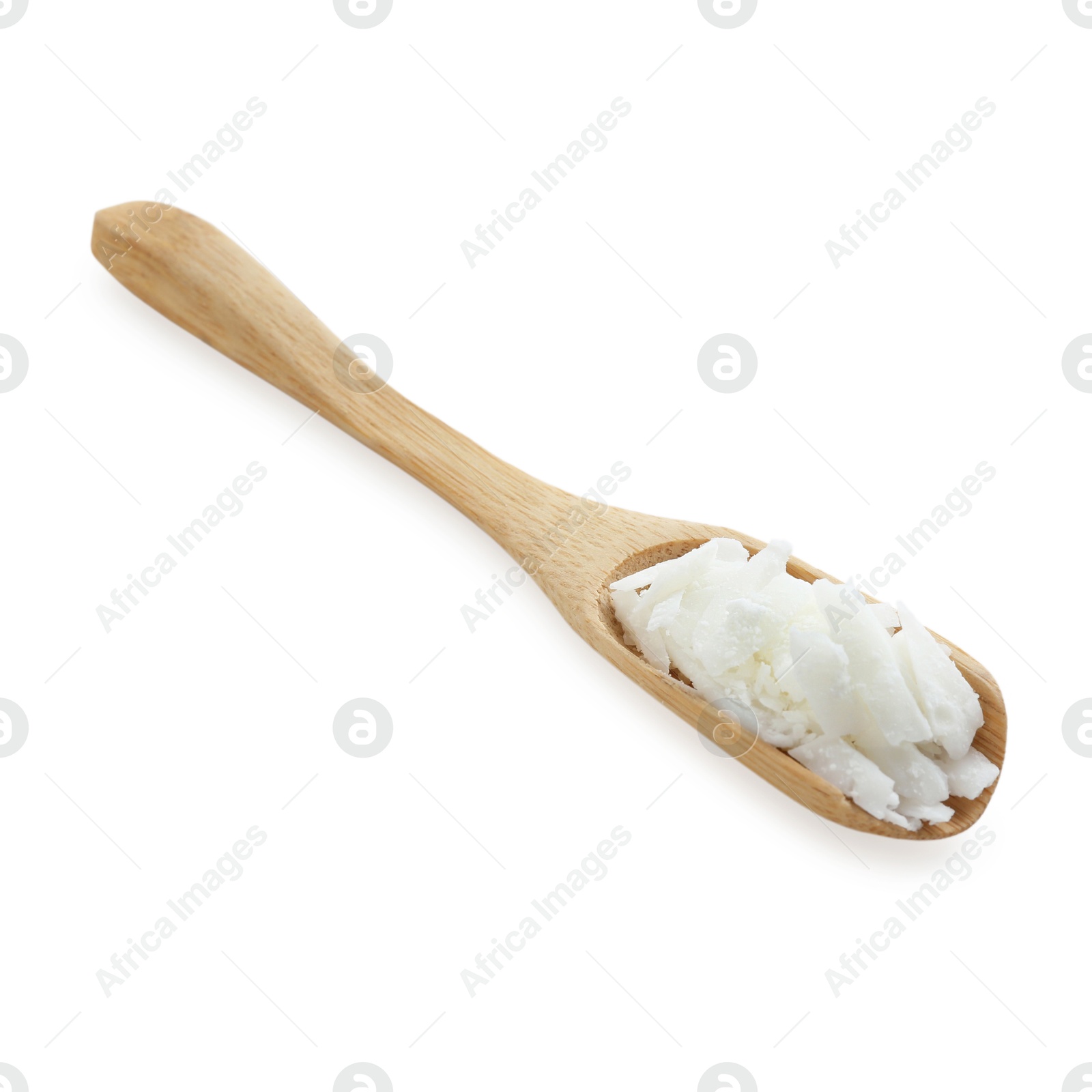 Photo of Soy wax in wooden spoon isolated on white