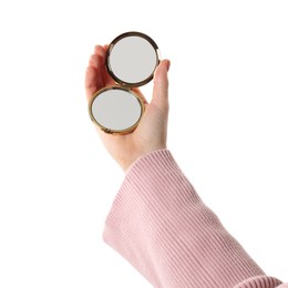 Photo of Woman holding pocket mirror on white background, closeup