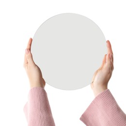 Woman holding round mirror on white background, closeup