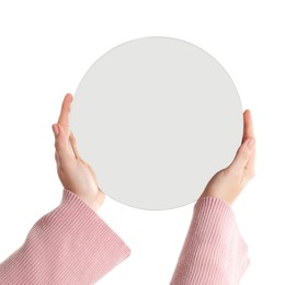 Woman holding round mirror on white background, closeup