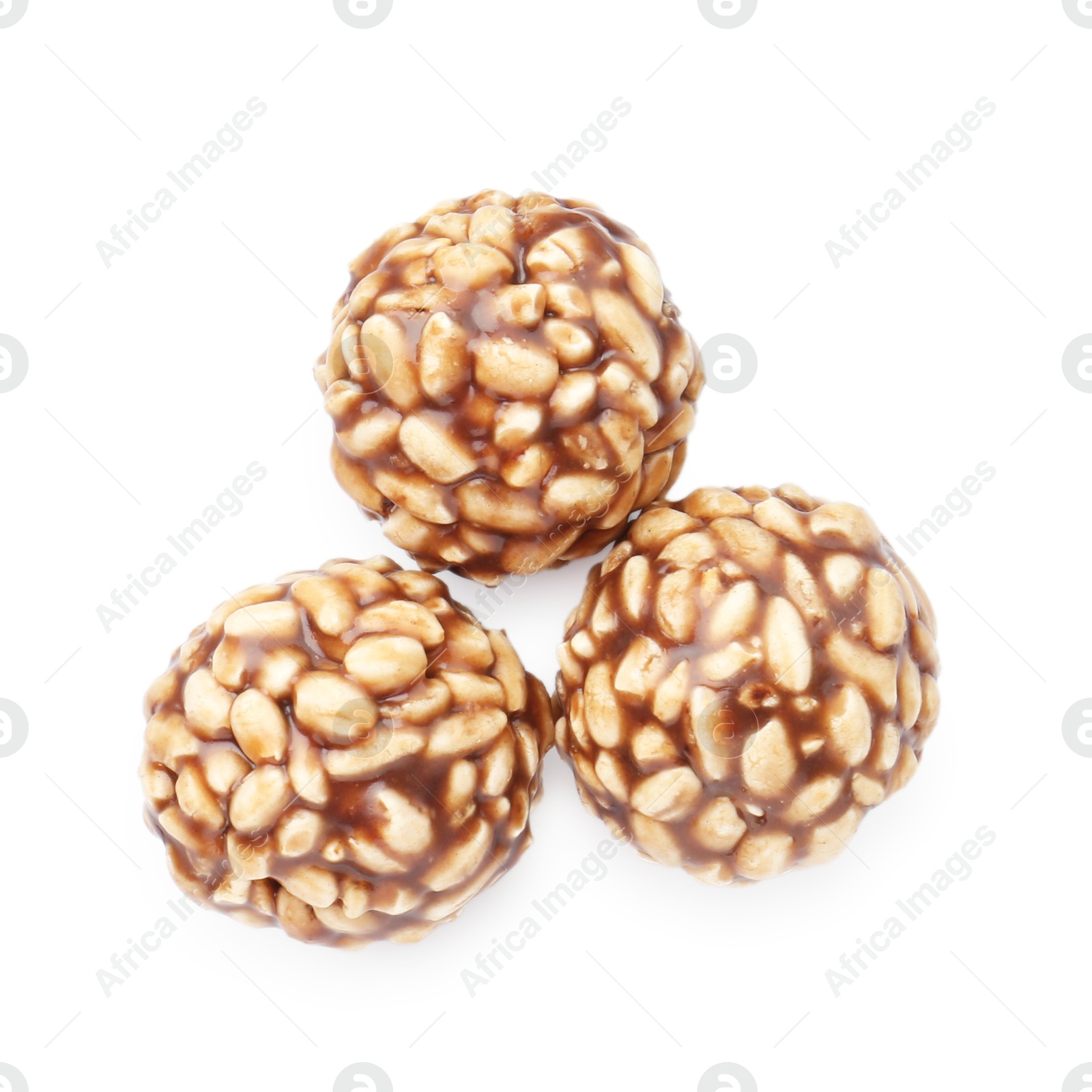 Photo of Delicious chocolate puffed rice balls isolated on white, top view