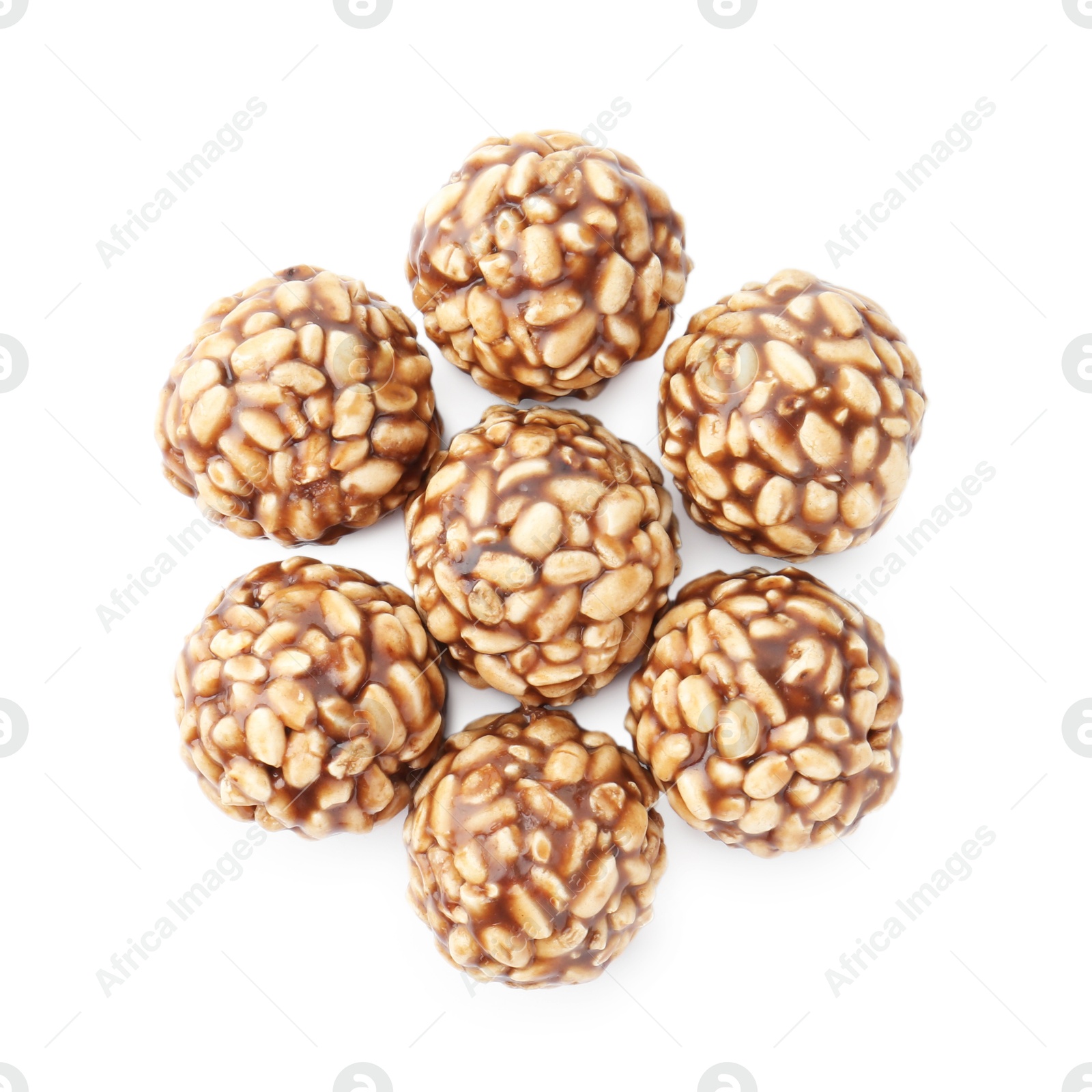 Photo of Delicious chocolate puffed rice balls isolated on white, top view