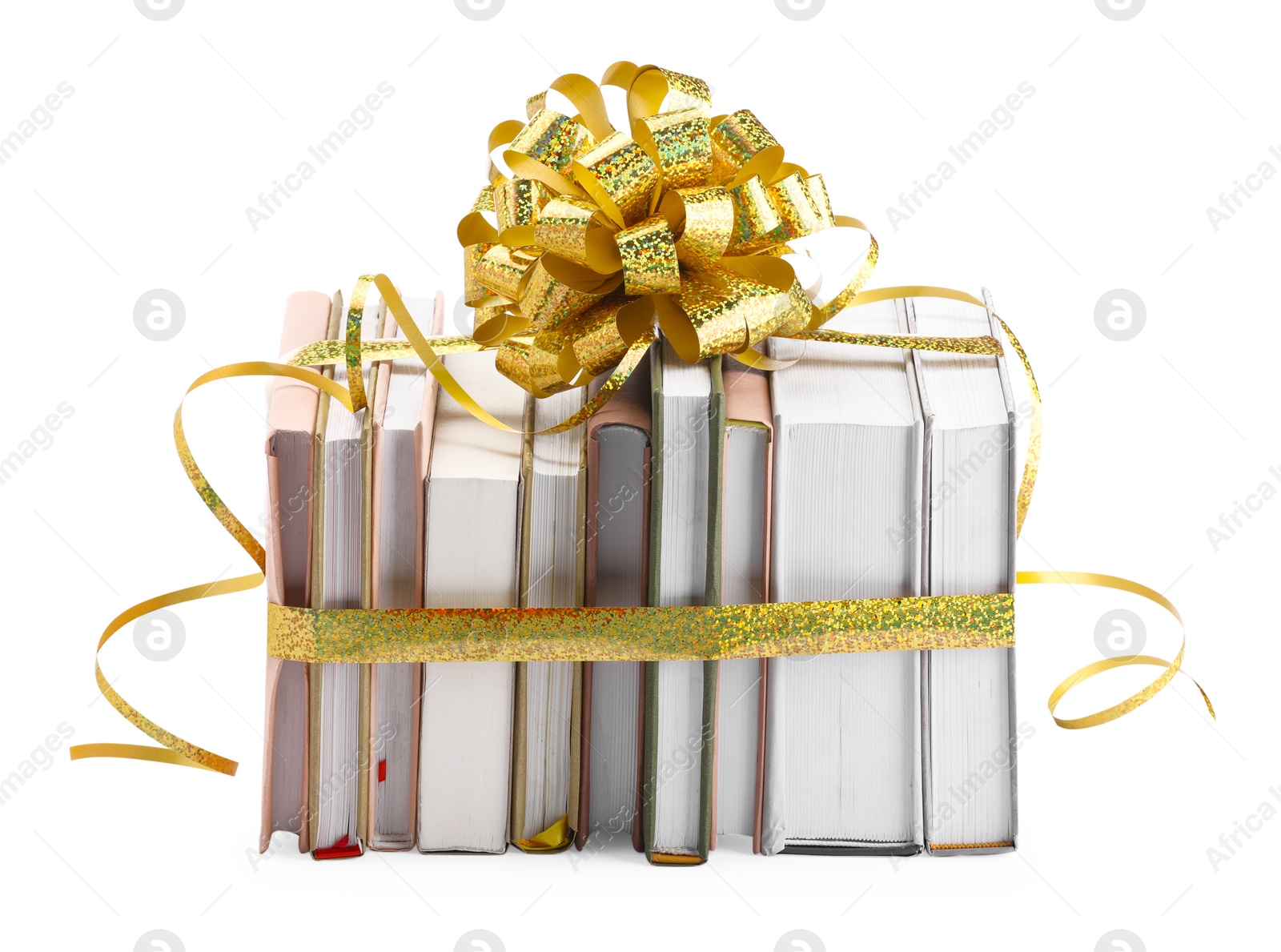 Photo of Books with golden bow as gift isolated on white