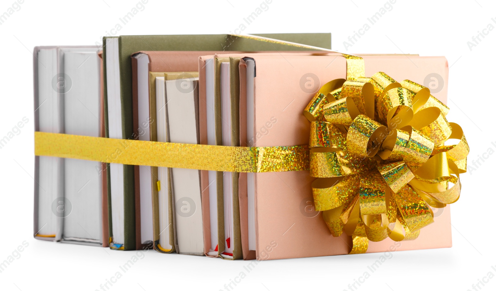 Photo of Books with golden bow as gift isolated on white