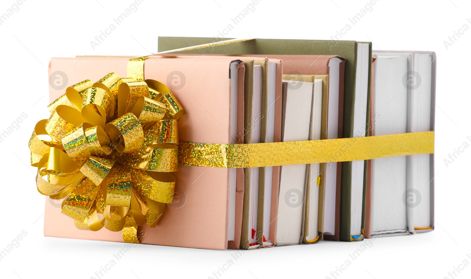 Photo of Books with golden bow as gift isolated on white