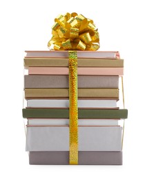 Photo of Stack of books with golden bow as gift isolated on white