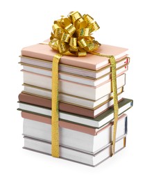 Photo of Stack of books with golden bow as gift isolated on white