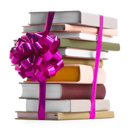 Photo of Stack of books with purple bow as gift isolated on white