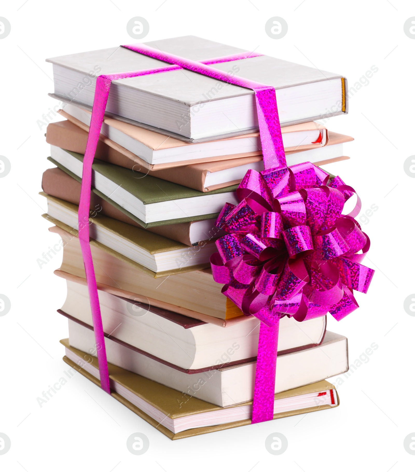 Photo of Stack of books with purple bow as gift isolated on white