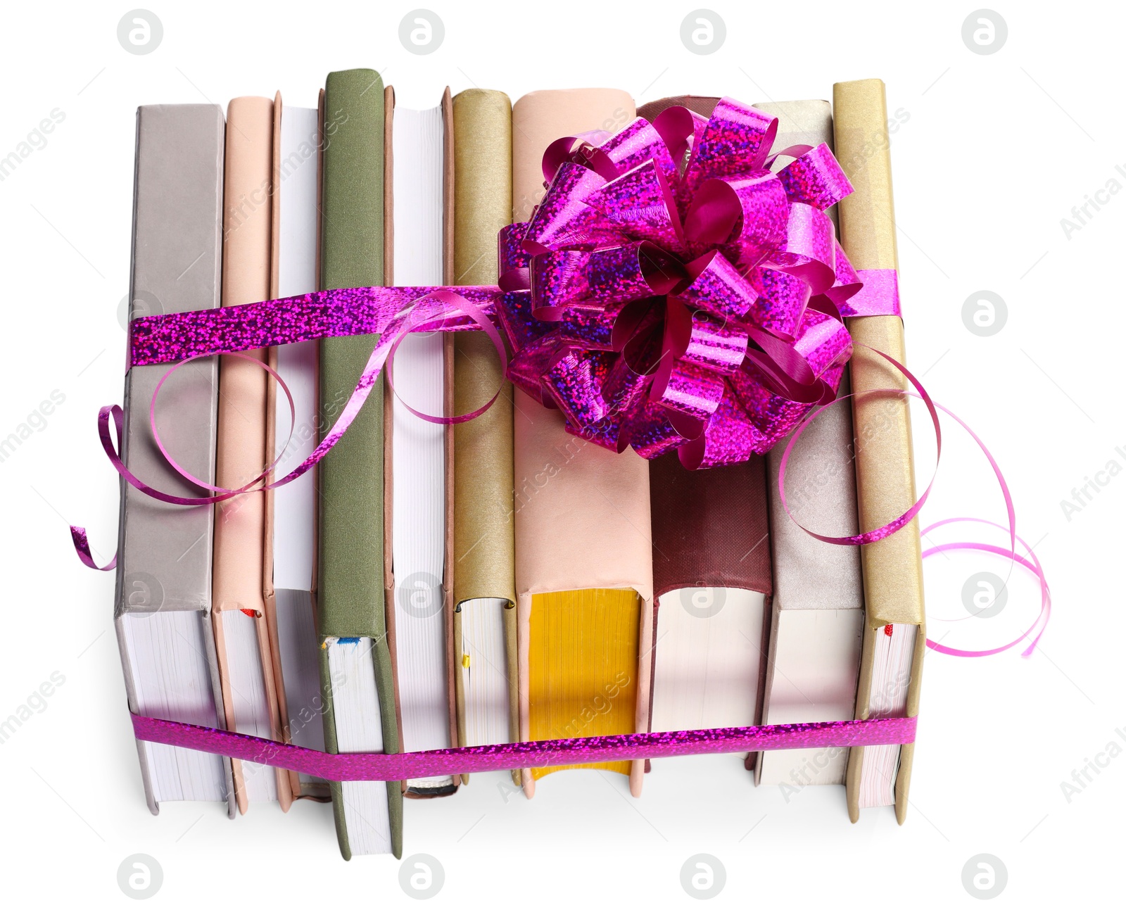 Photo of Books with purple bow as gift isolated on white