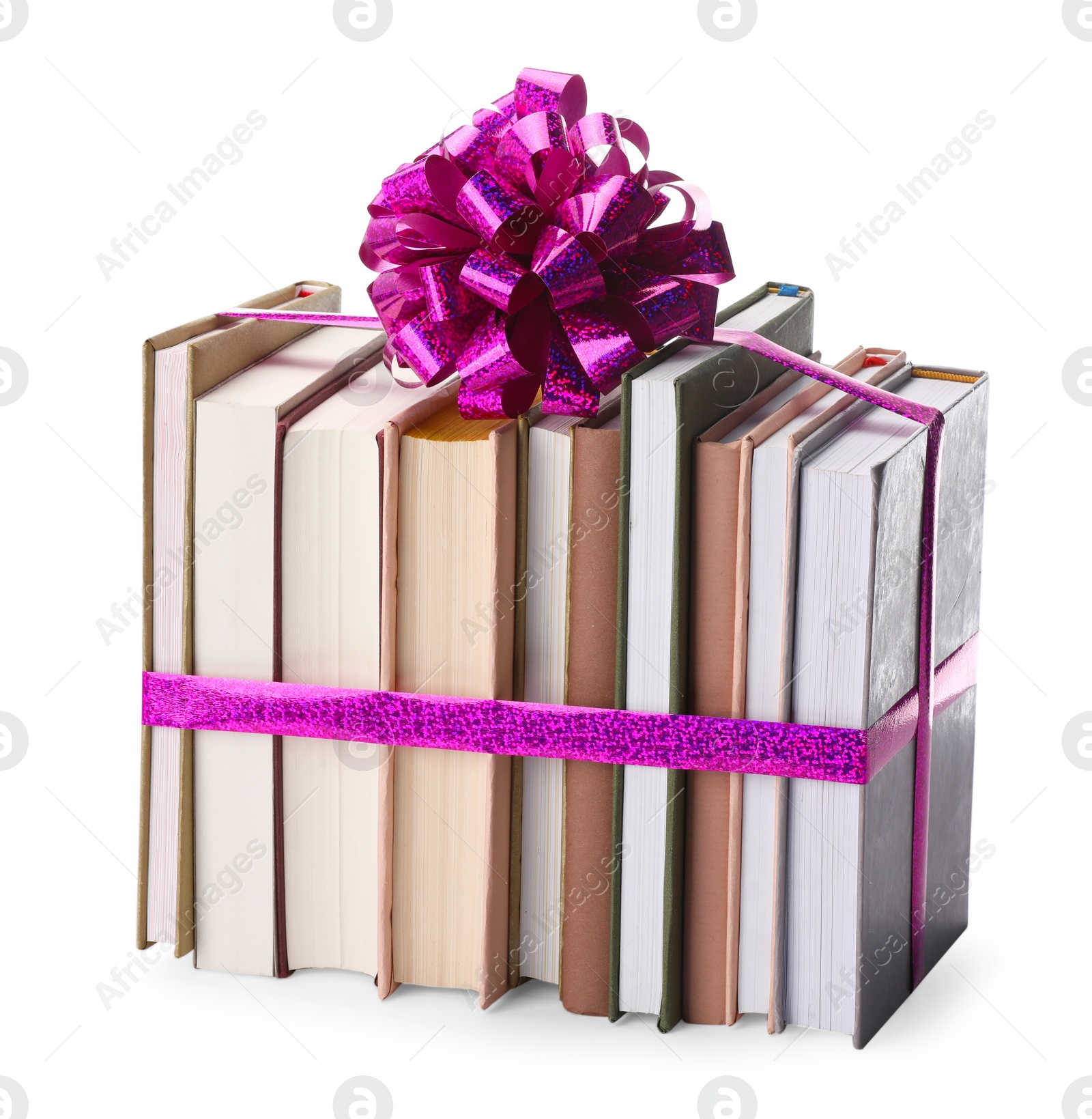 Photo of Books with purple bow as gift isolated on white