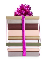 Photo of Stack of books with purple bow as gift isolated on white