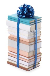 Photo of Stack of books with blue bow as gift isolated on white