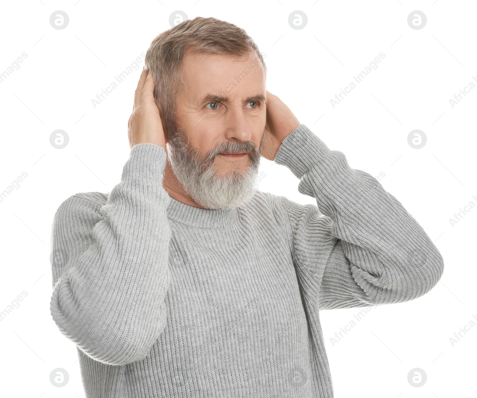 Photo of Senior man covering her ears on white background