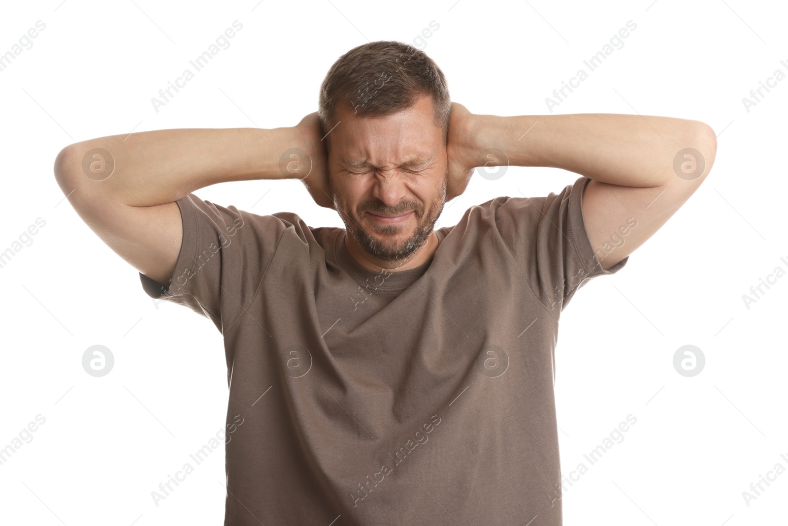 Photo of Man covering his ears on white background