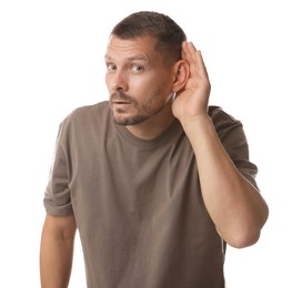 Photo of Man showing hand to ear gesture on white background