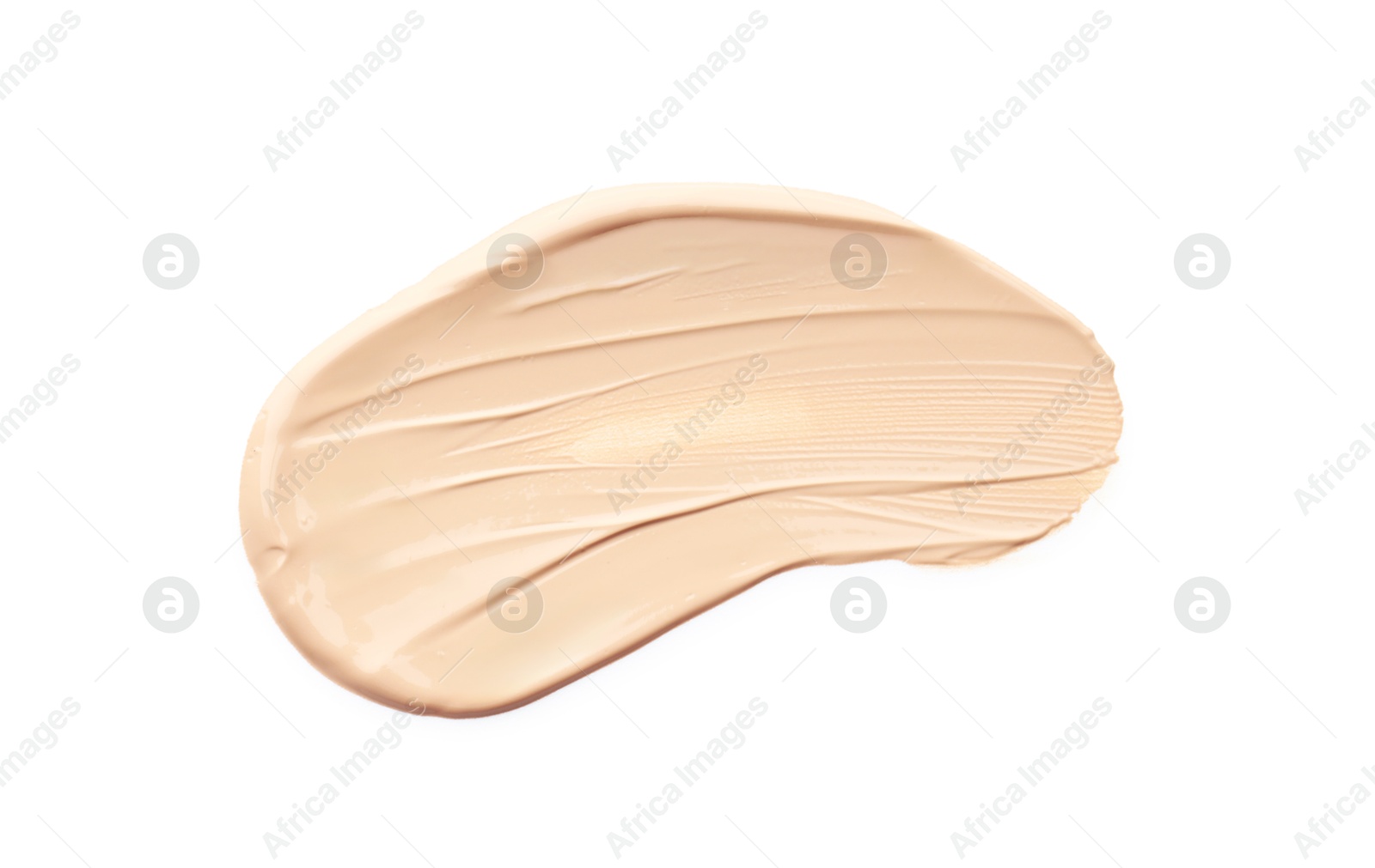 Photo of Skin foundation isolated on white, top view. Sample of cosmetic product