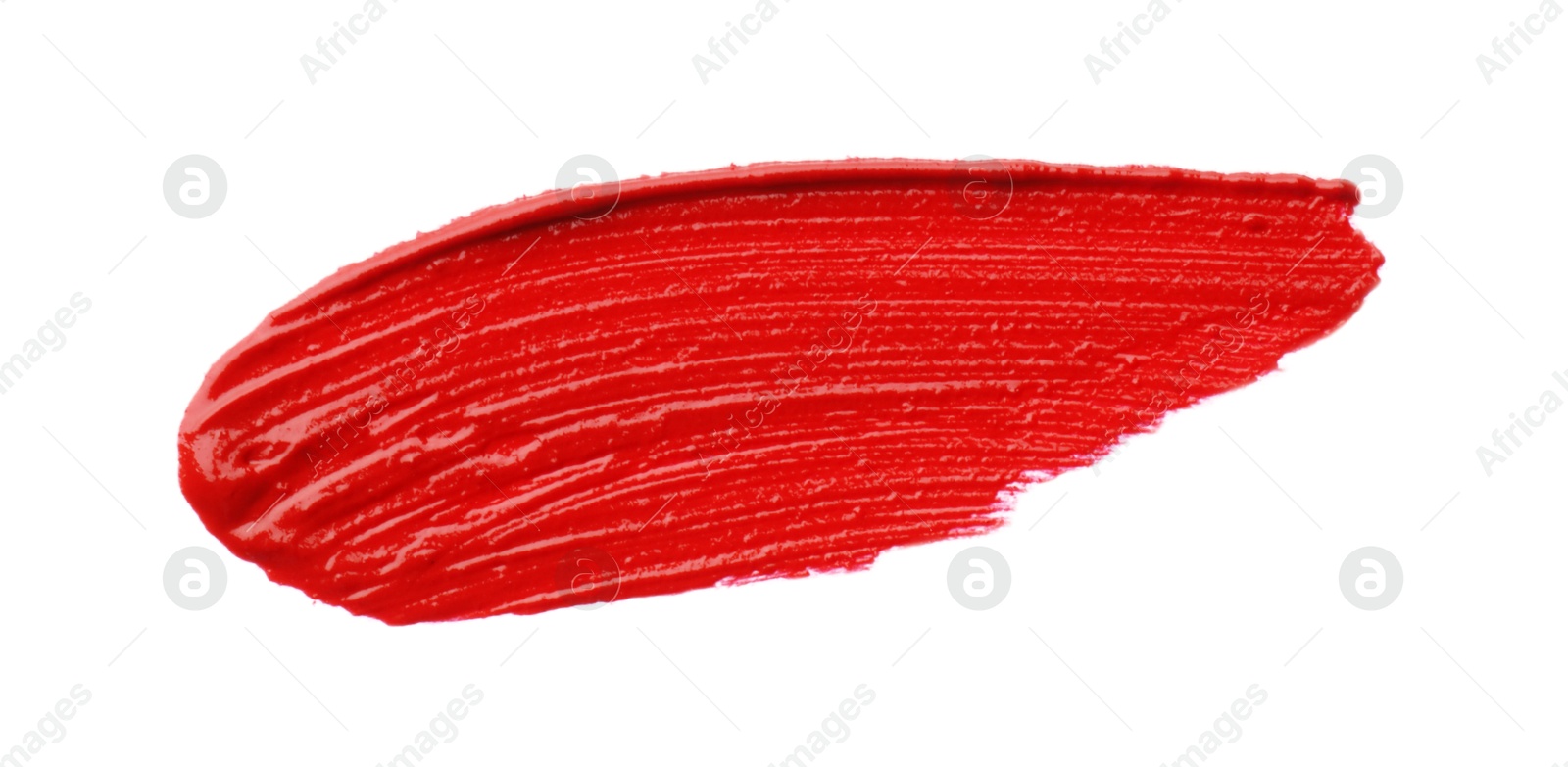 Photo of Red lipstick isolated on white, top view. Sample of cosmetic product