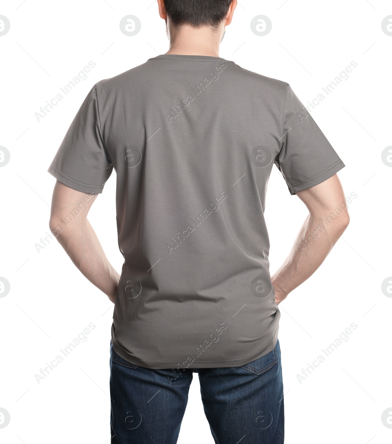 Photo of Man in blank grey t-shirt on white background, back view. Mockup for design