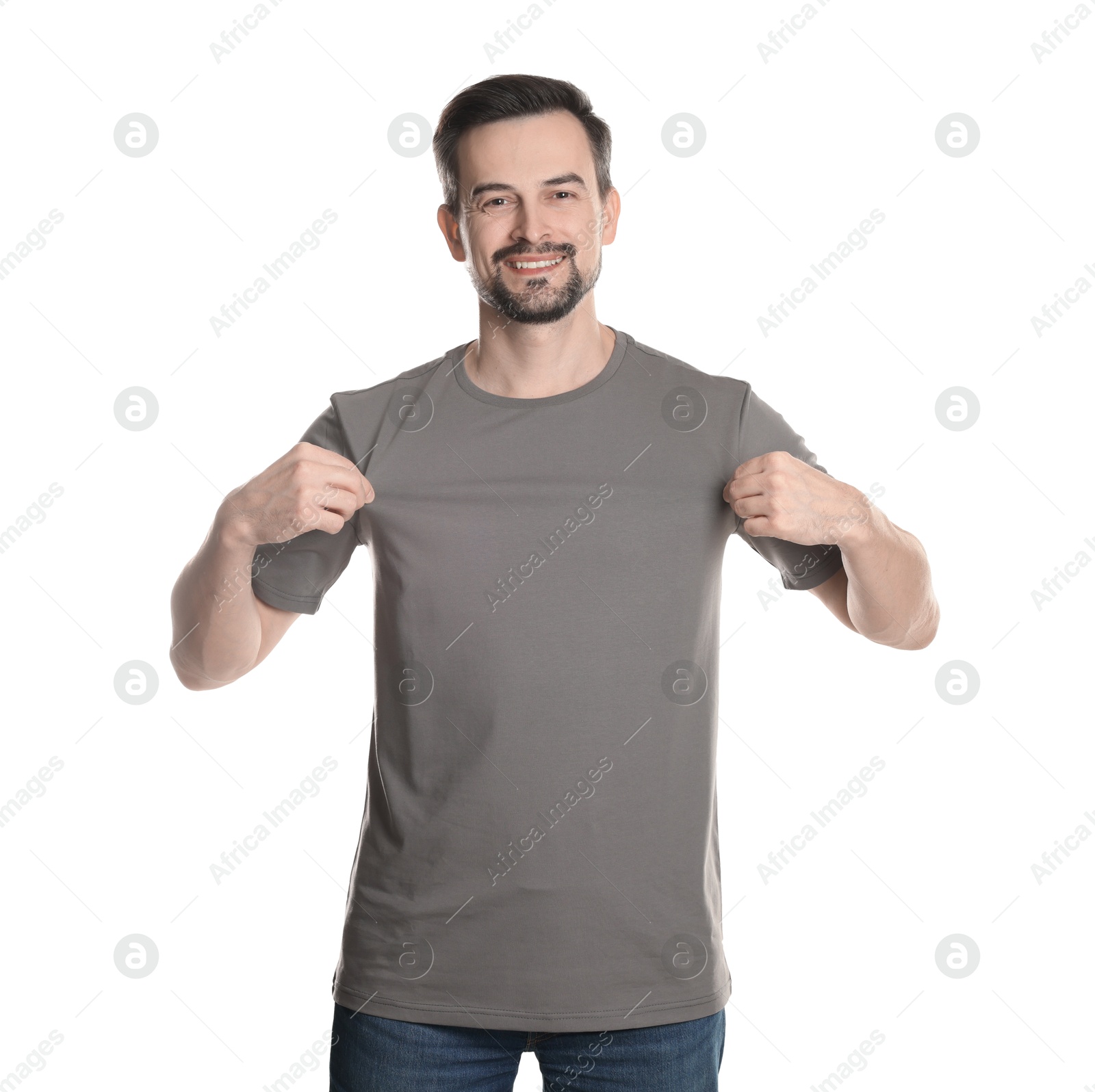 Photo of Man in blank grey t-shirt on white background. Mockup for design