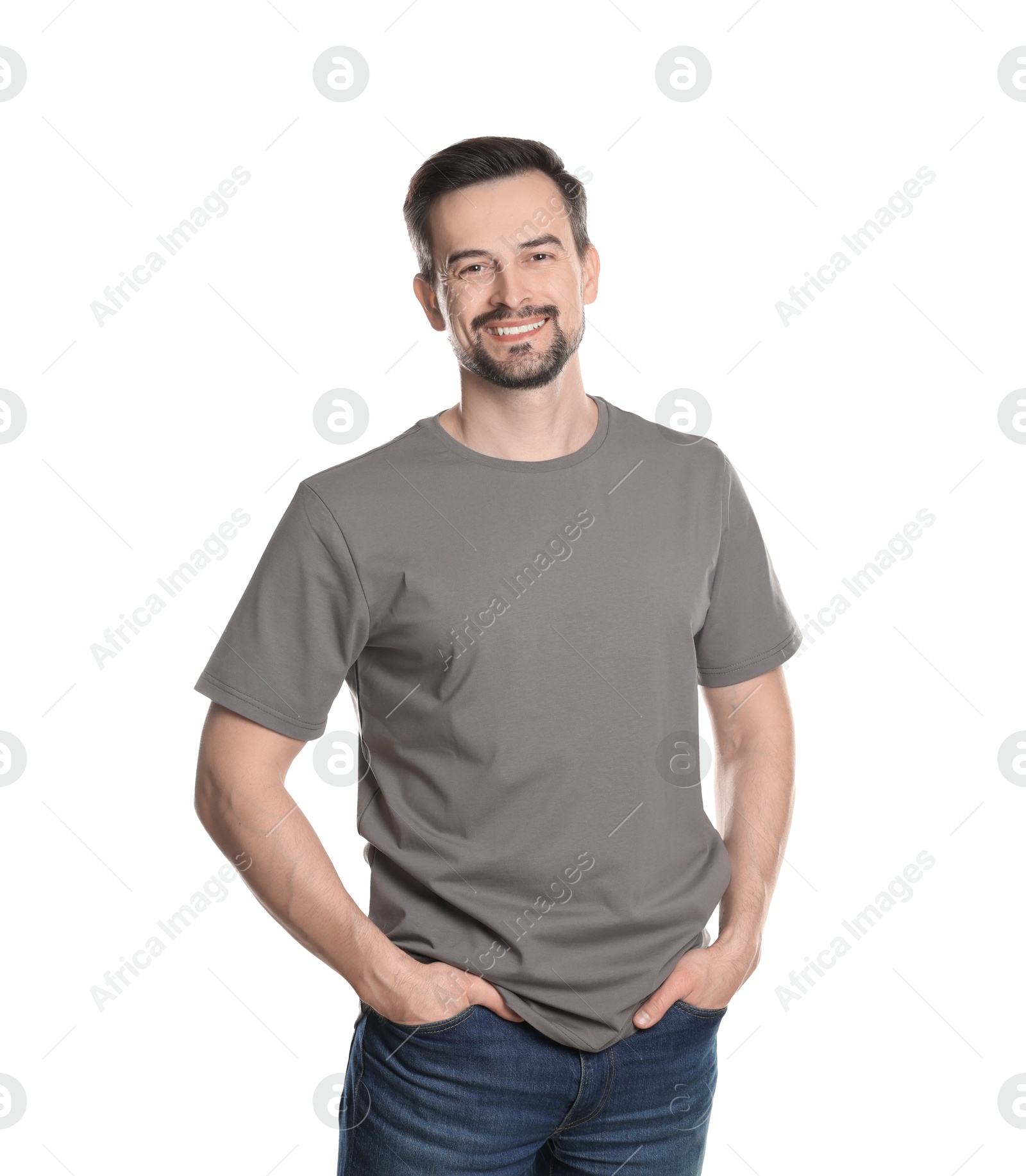 Photo of Man in blank grey t-shirt on white background. Mockup for design