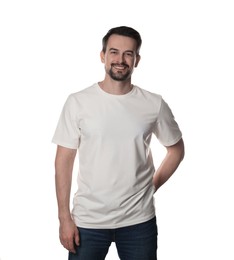 Photo of Man in blank t-shirt on white background. Mockup for design