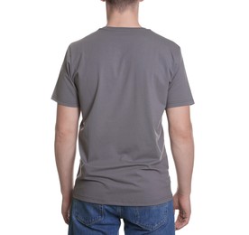 Photo of Man in stylish t-shirt on white background, back view. Mockup for design