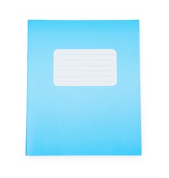 Photo of One blue copybook isolated on white, top view. School stationery