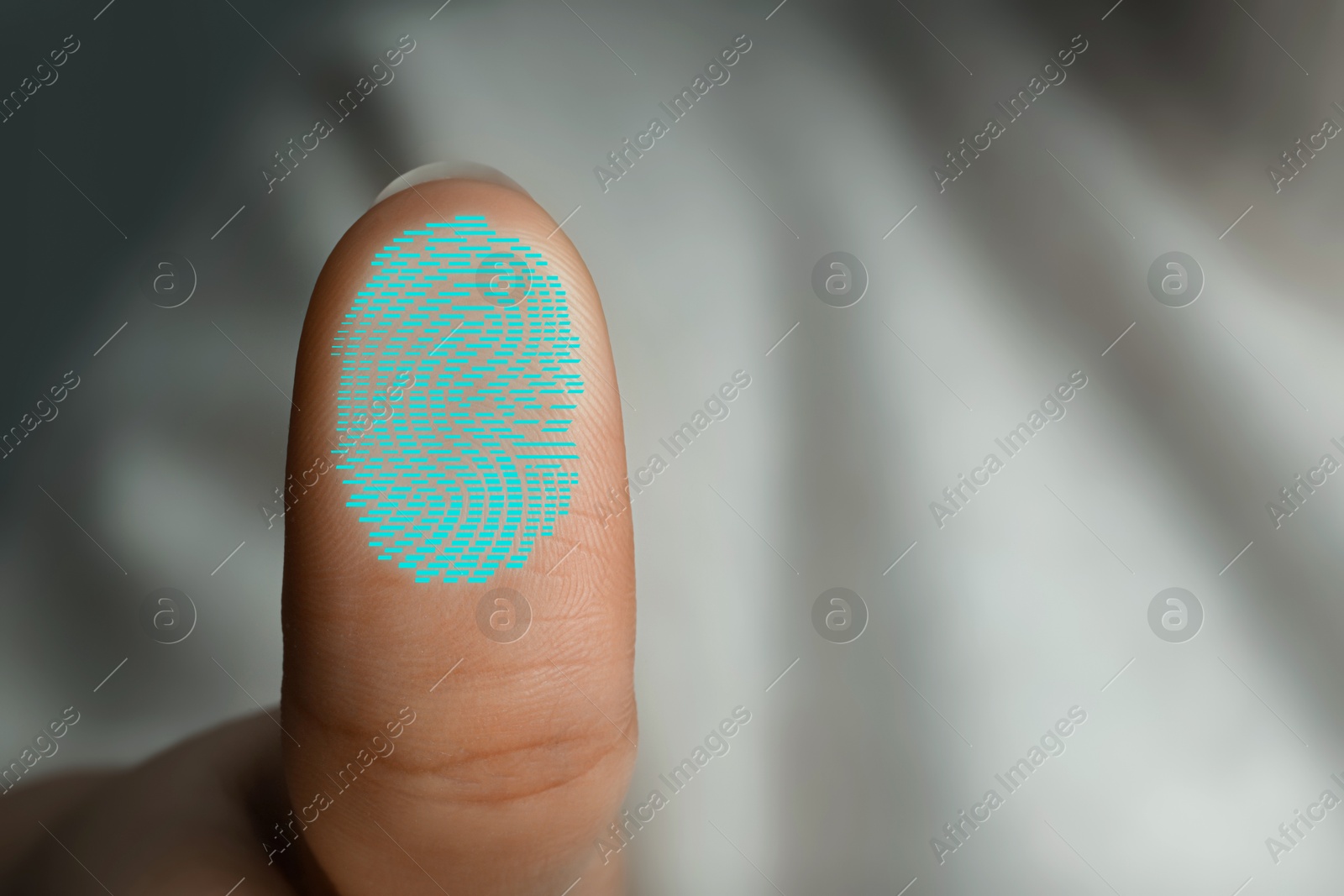 Image of Woman pressing finger to surface showing friction ridges pattern, closeup. Scanning fingerprint