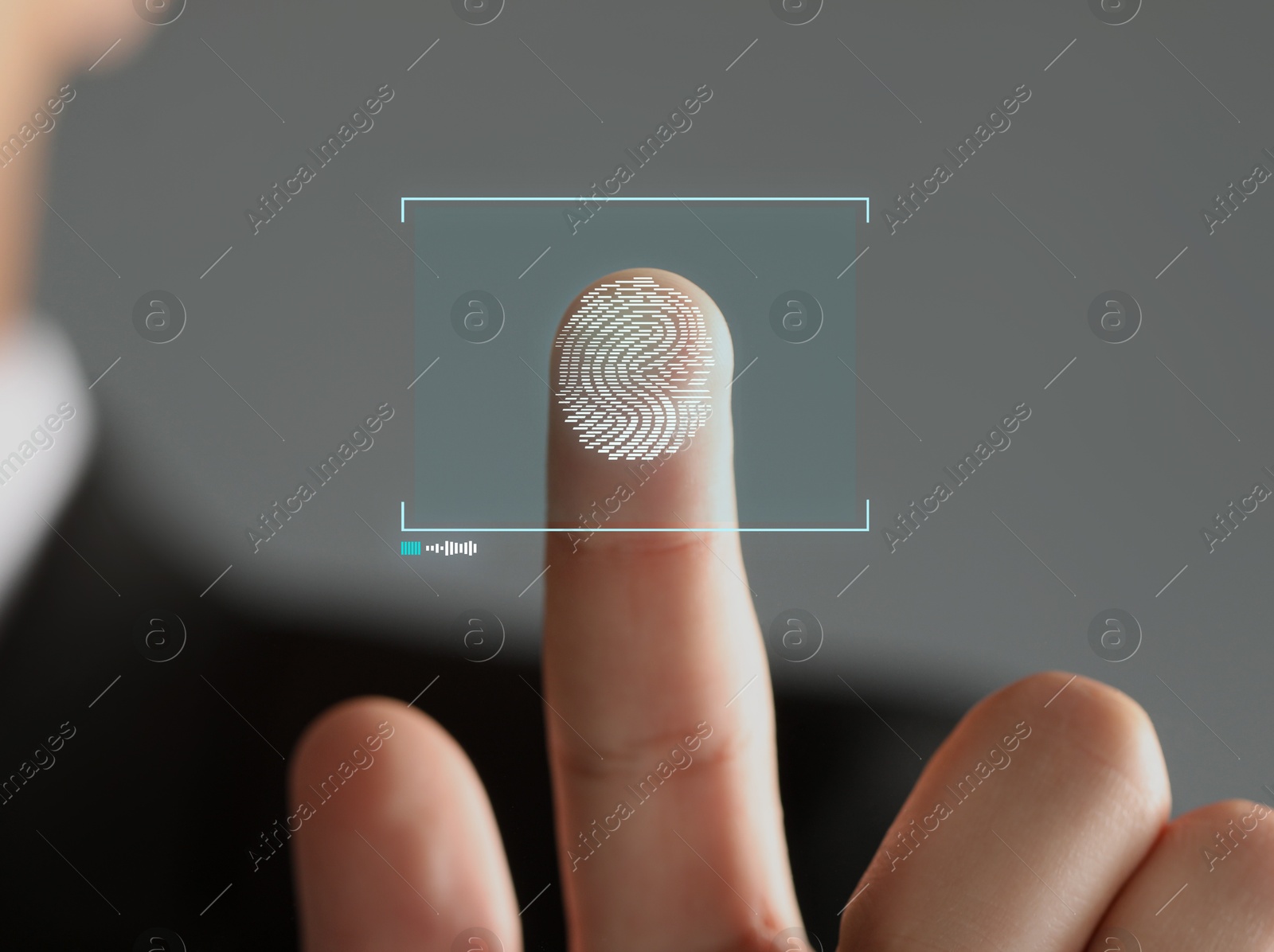 Image of Man pressing finger to surface showing friction ridges pattern, closeup. Scanning fingerprint