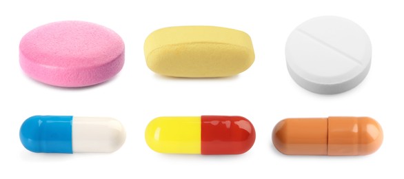 Image of Set of different antibiotic pills isolated on white