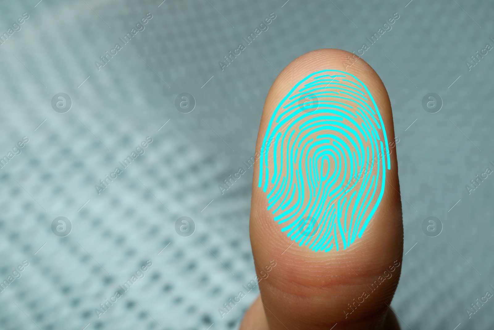 Image of Woman pressing finger to surface showing friction ridges pattern, closeup. Scanning fingerprint