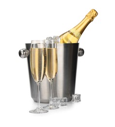 Photo of Champagne and bucket with ice isolated on white