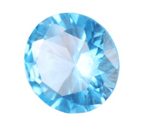 Photo of One shiny light blue gemstone isolated on white, top view