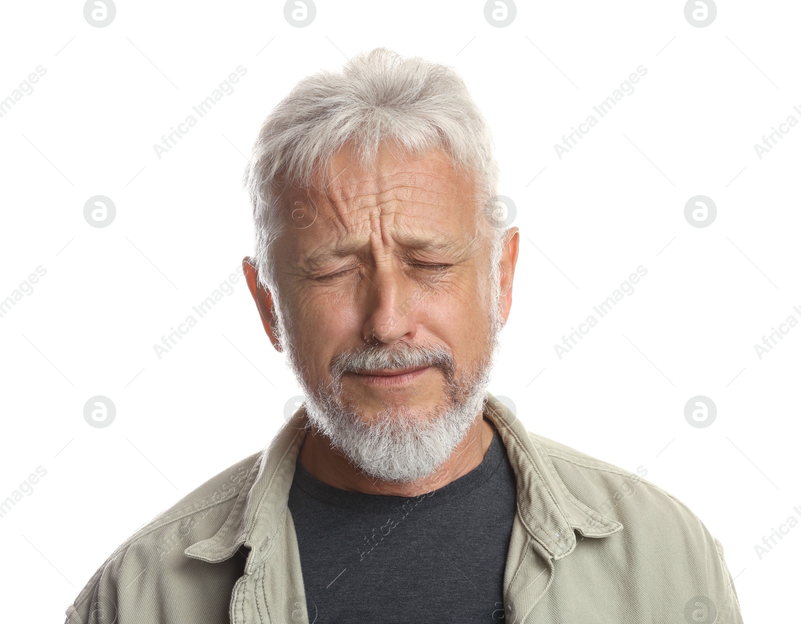 Photo of Sad senior man crying on white background