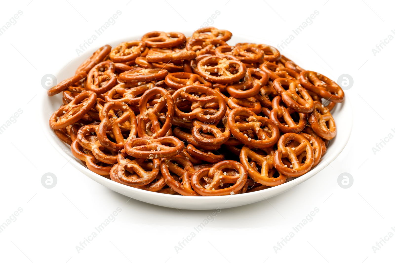 Photo of Tasty pretzel crackers in bowl isolated on white