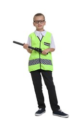 Photo of Little girl with baton pretending to be policewoman on white background. Dreaming of future profession