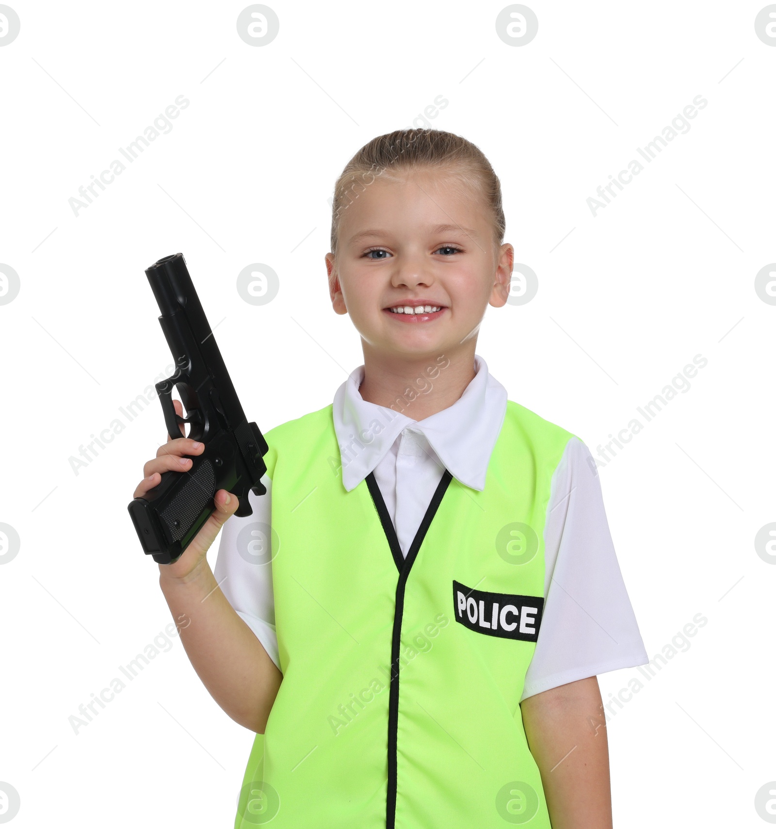 Photo of Little girl with gun pretending to be policewoman on white background. Dreaming of future profession