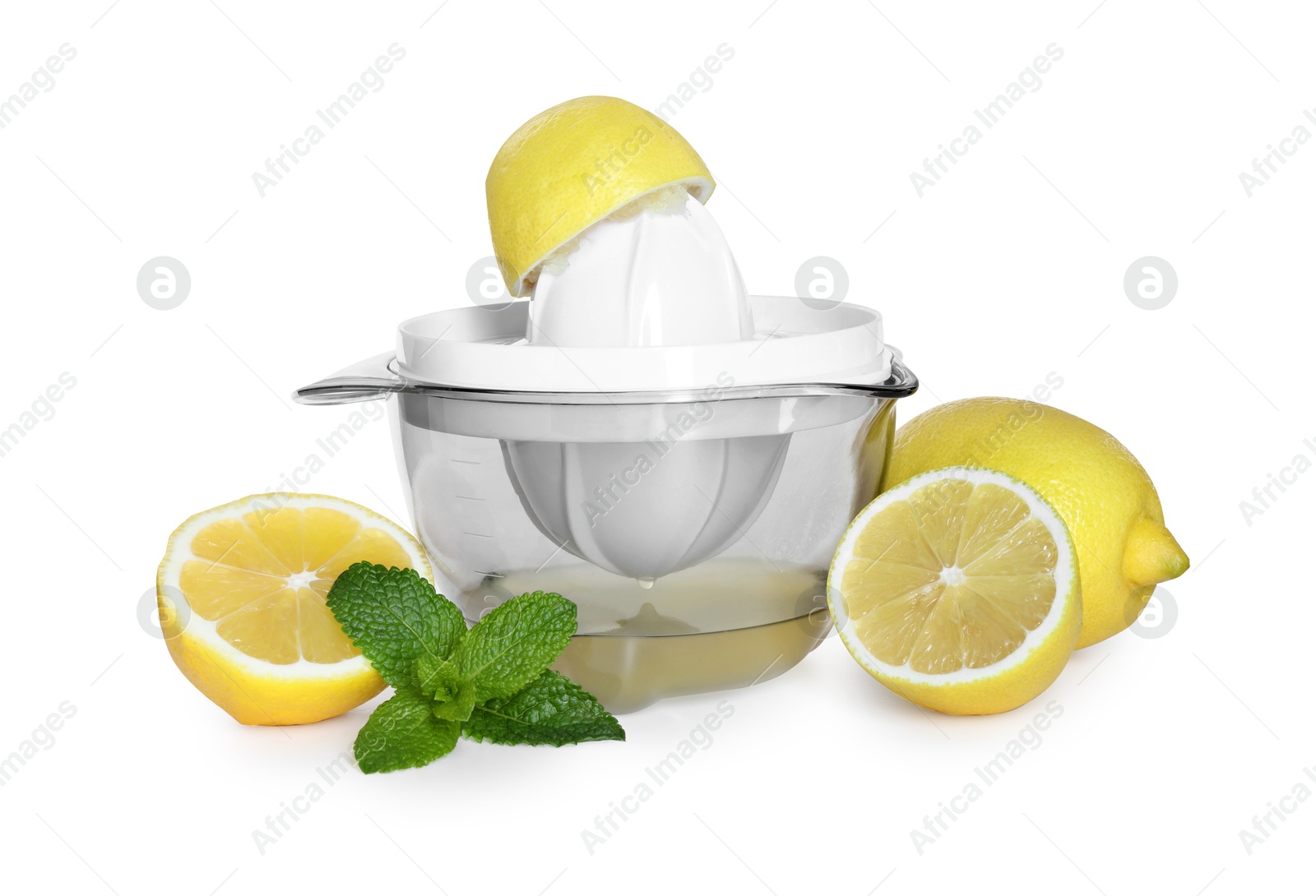 Photo of Juicer, fresh lemons and mint isolated on white