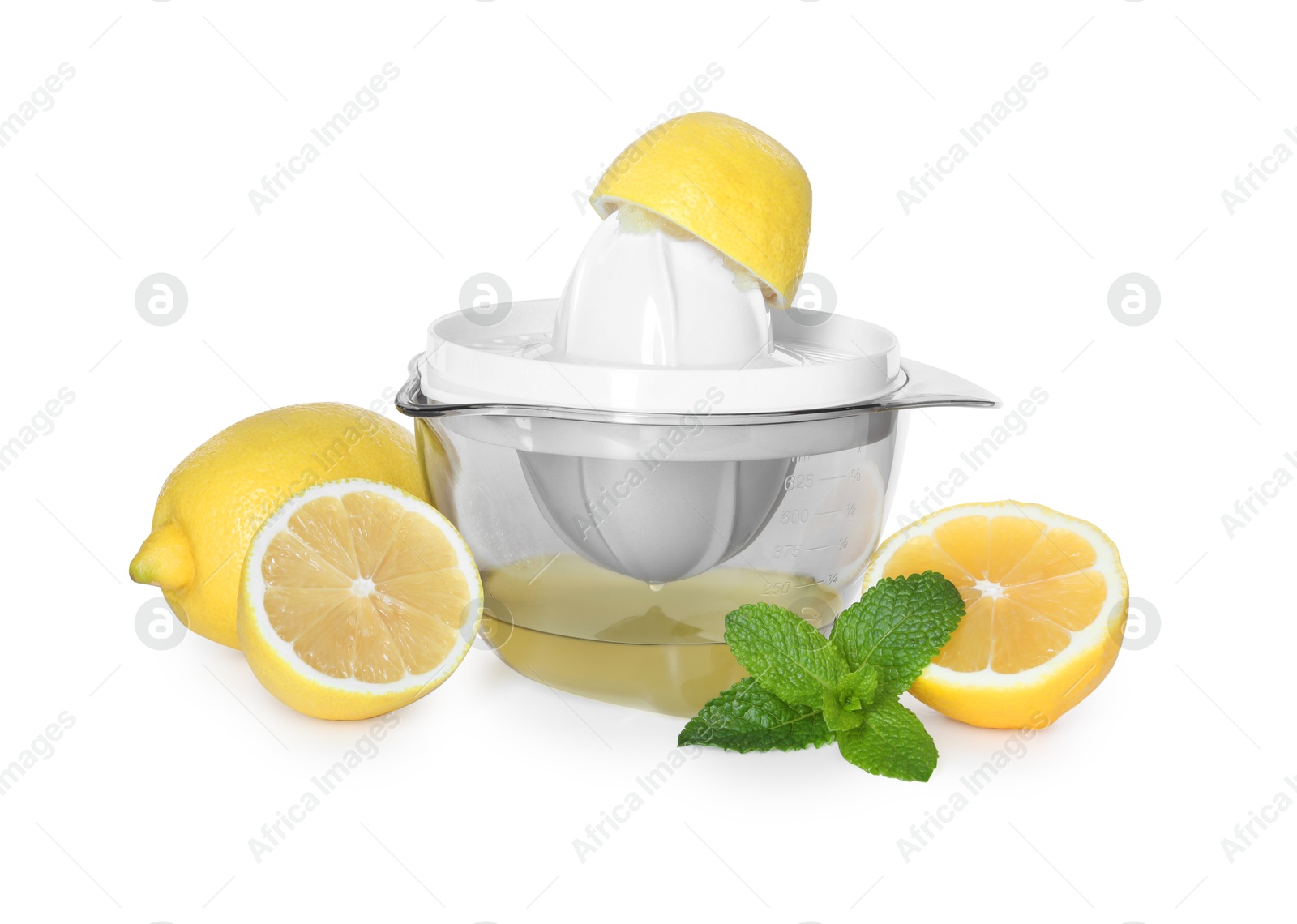 Photo of Juicer, fresh lemons and mint isolated on white