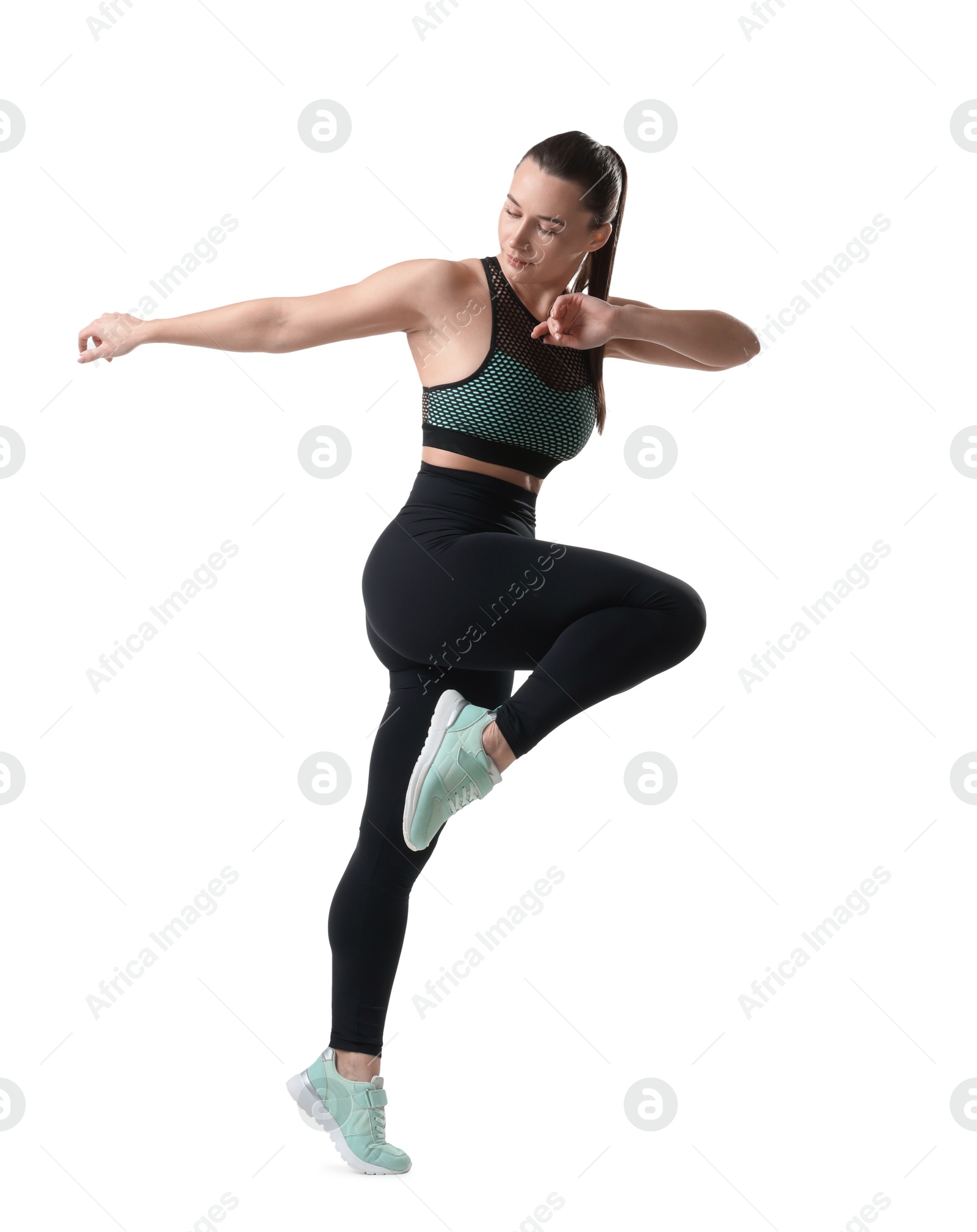 Photo of Beautiful woman in sportswear training on white background