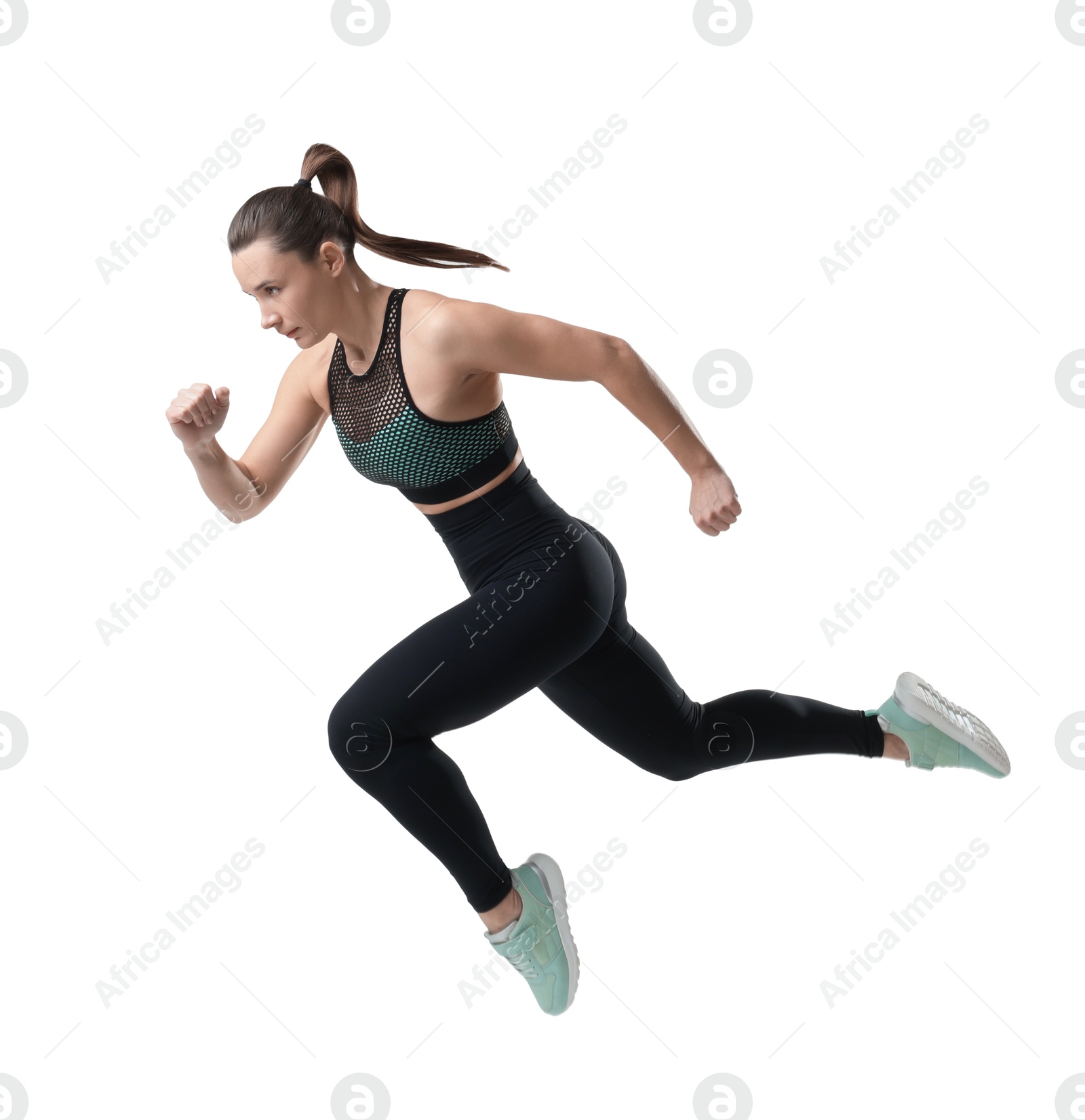 Photo of Beautiful woman in sportswear running on white background