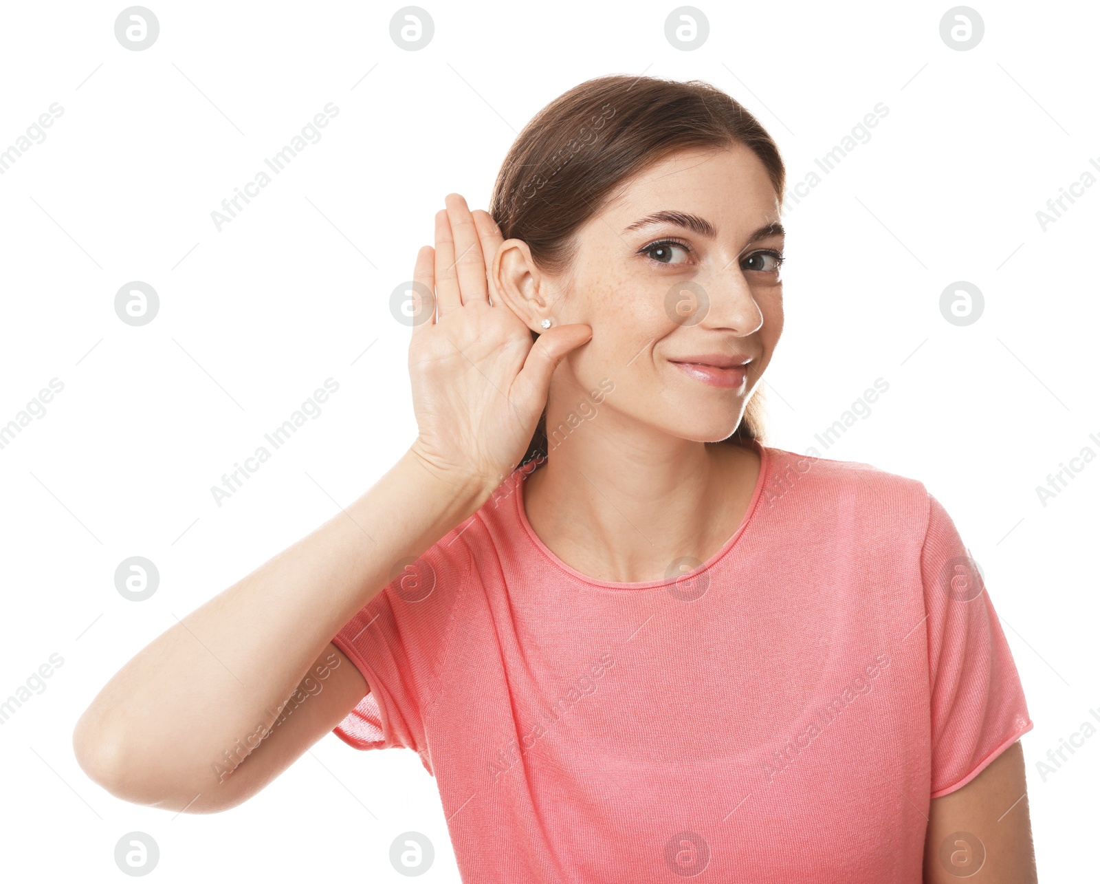 Photo of Woman showing hand to ear gesture on white background