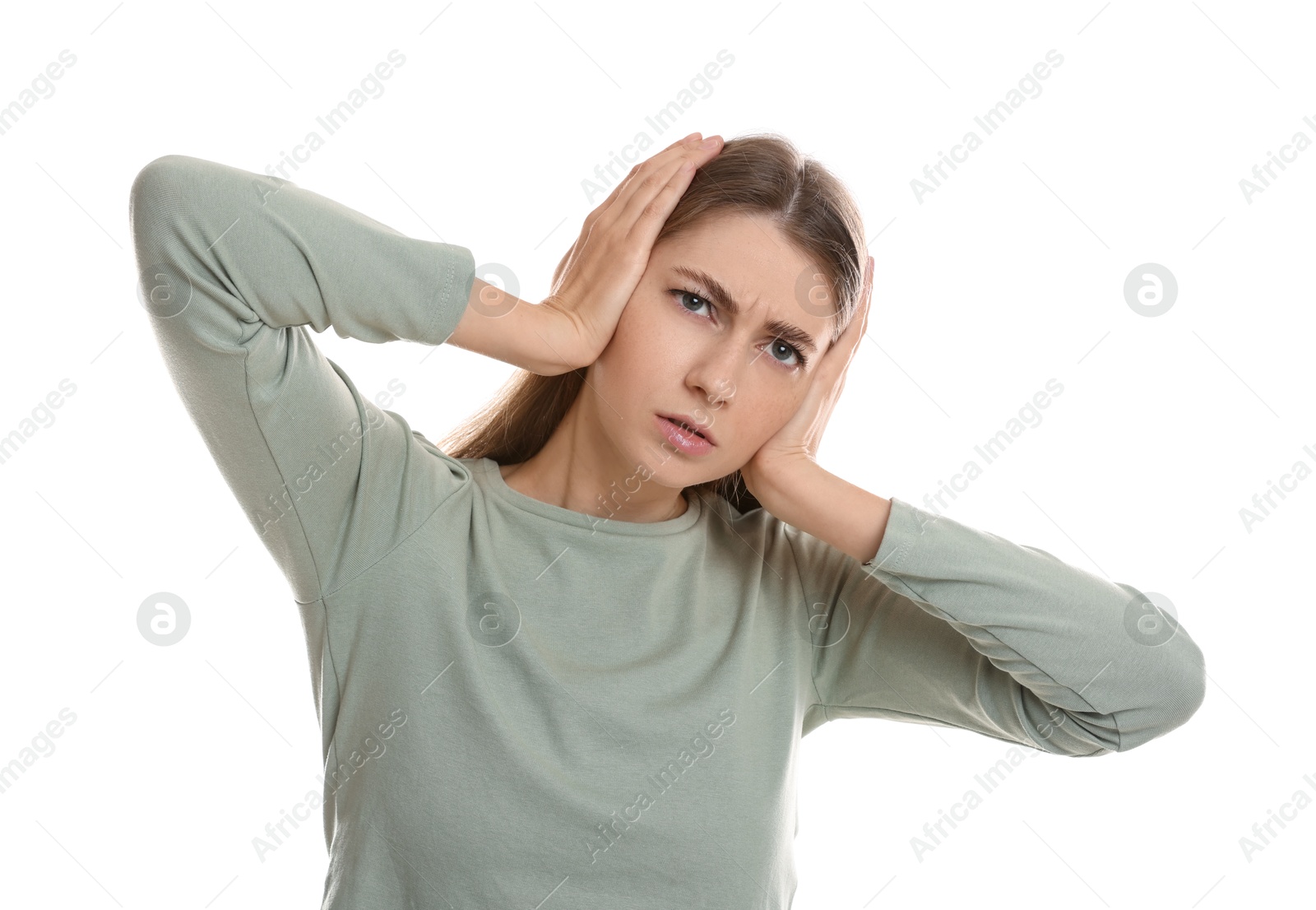 Photo of Woman covering her ears on white background