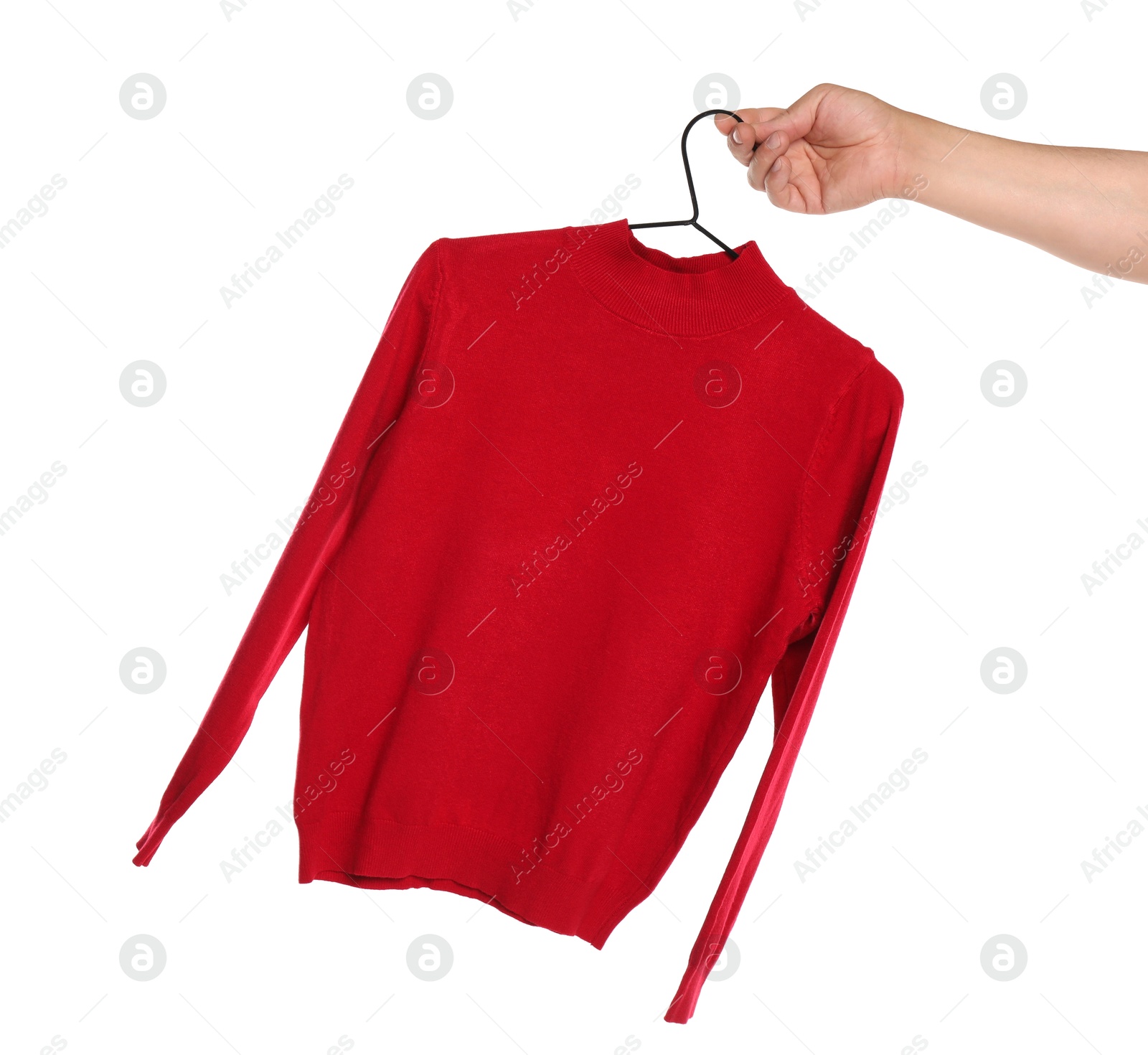 Photo of Woman holding hanger with red long sleeve on white background, closeup