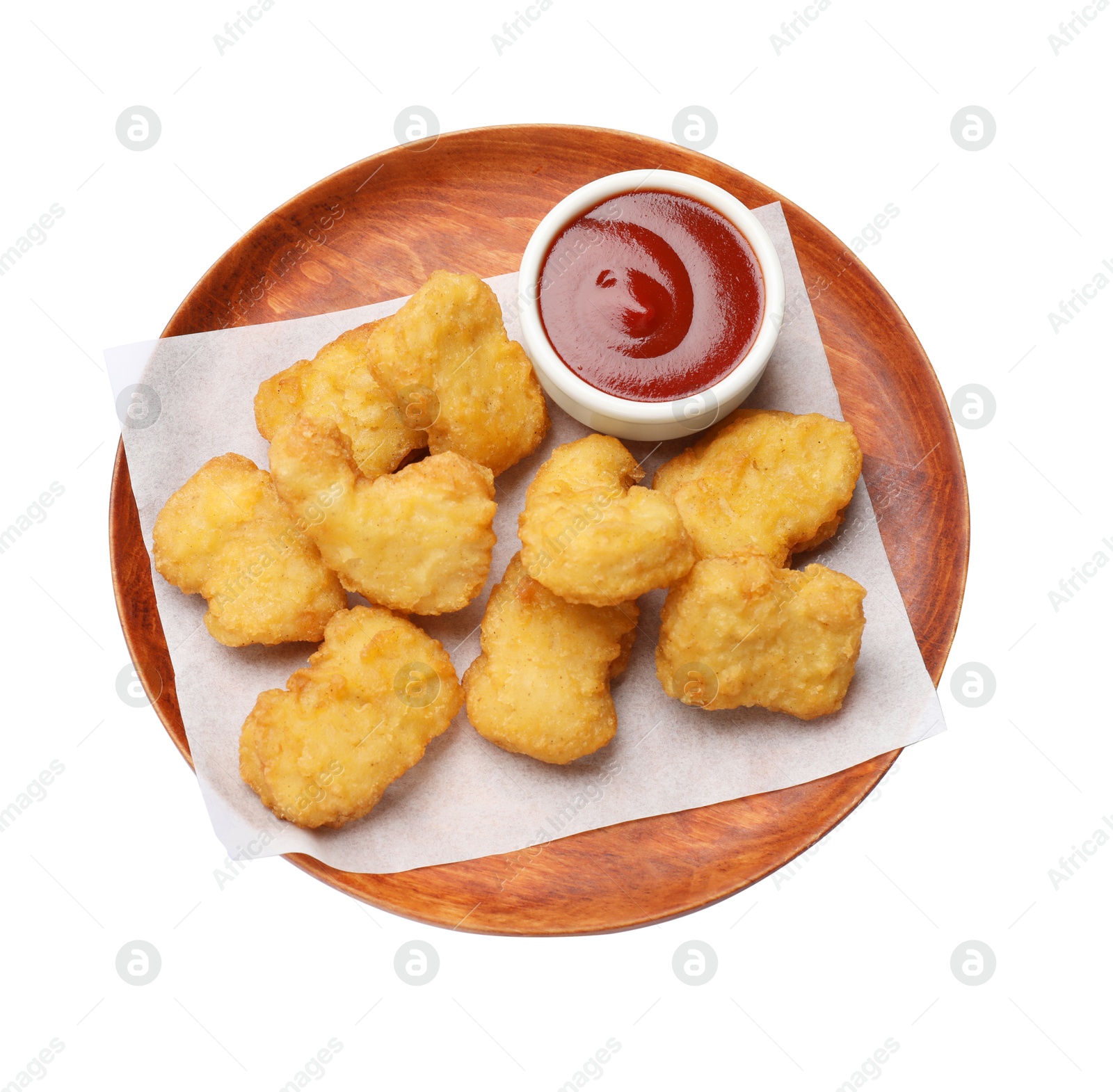 Photo of Delicious chicken nuggets and ketchup isolated on white, top view