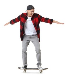 Photo of Happy man riding skateboard on white background