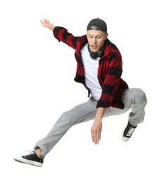 Photo of Handsome young skater jumping on white background