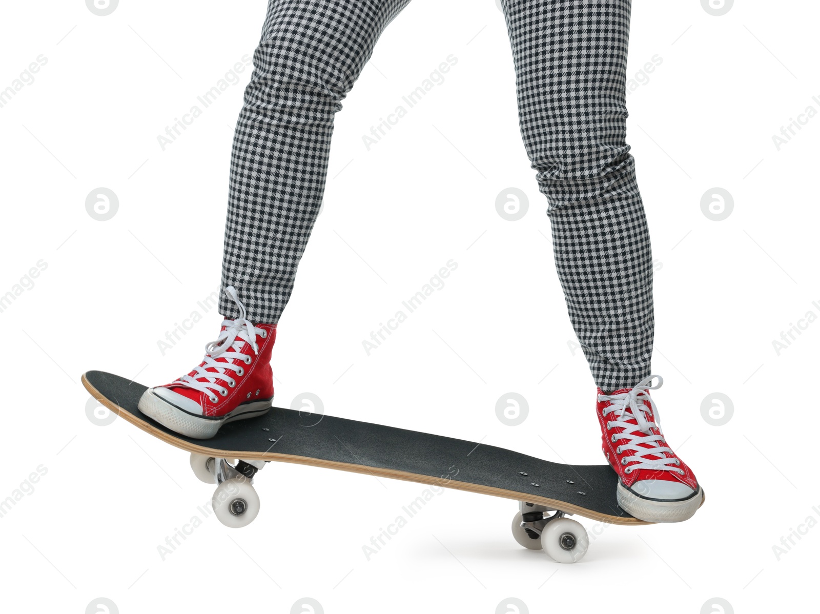 Photo of Woman riding skateboard on white background, closeup