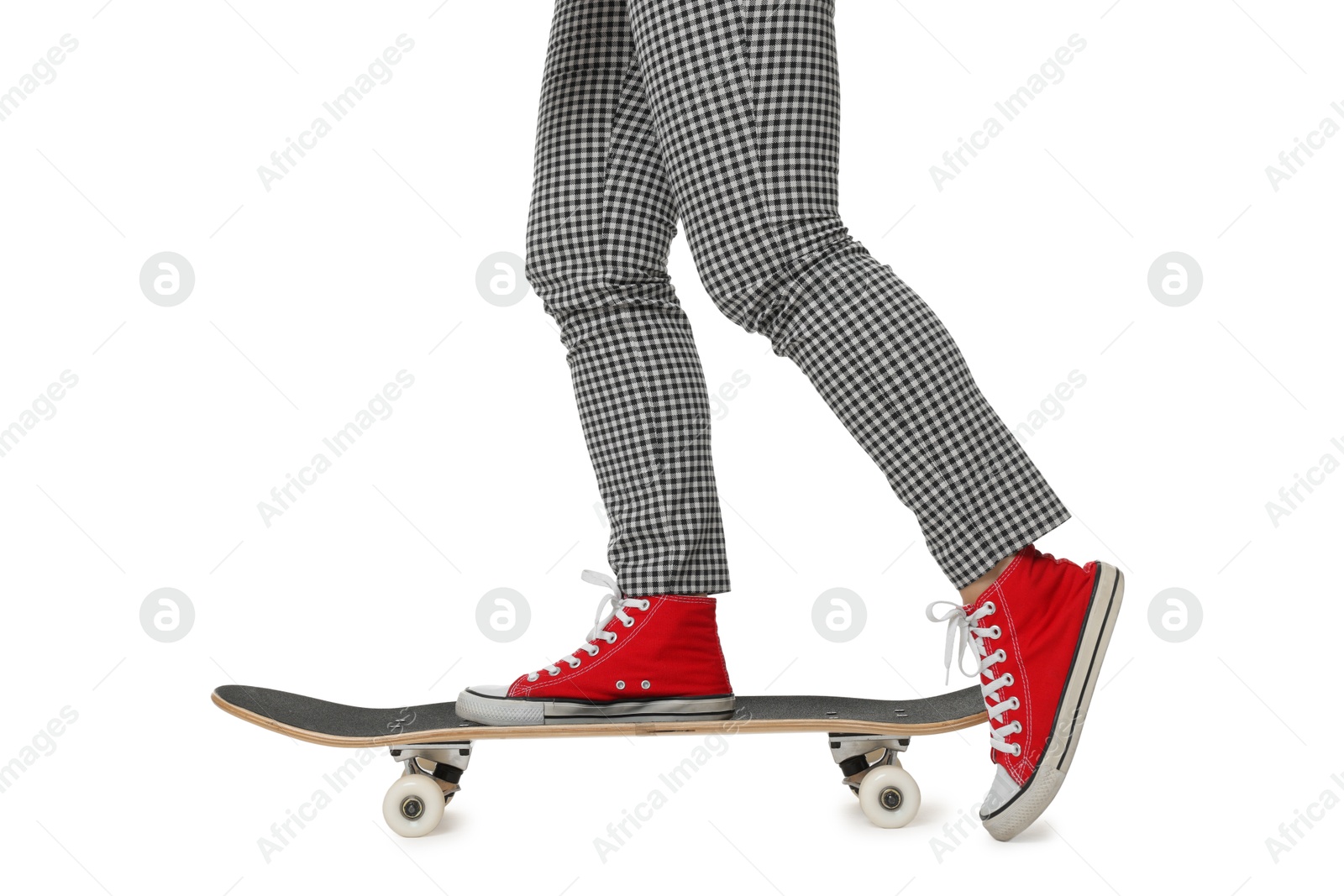 Photo of Woman riding skateboard on white background, closeup